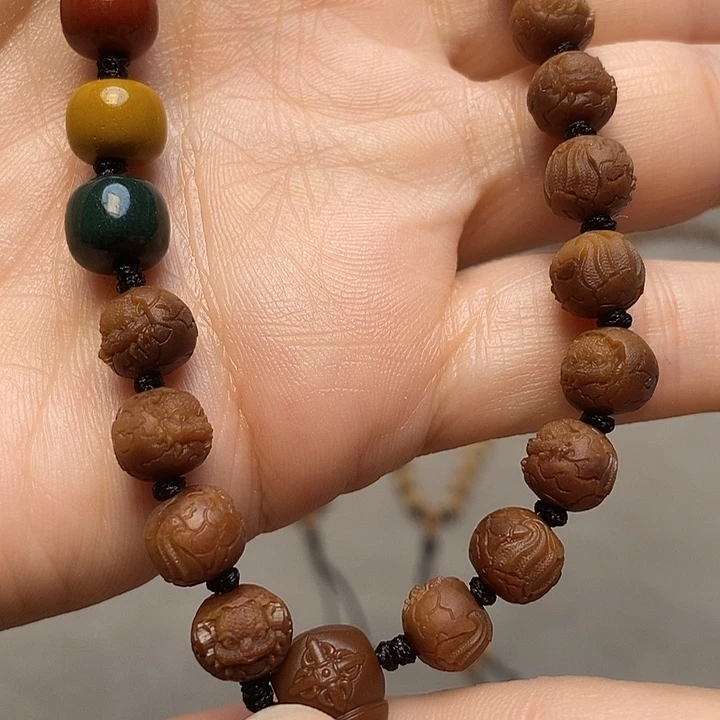 橄榄核手串0.8龙宝宝