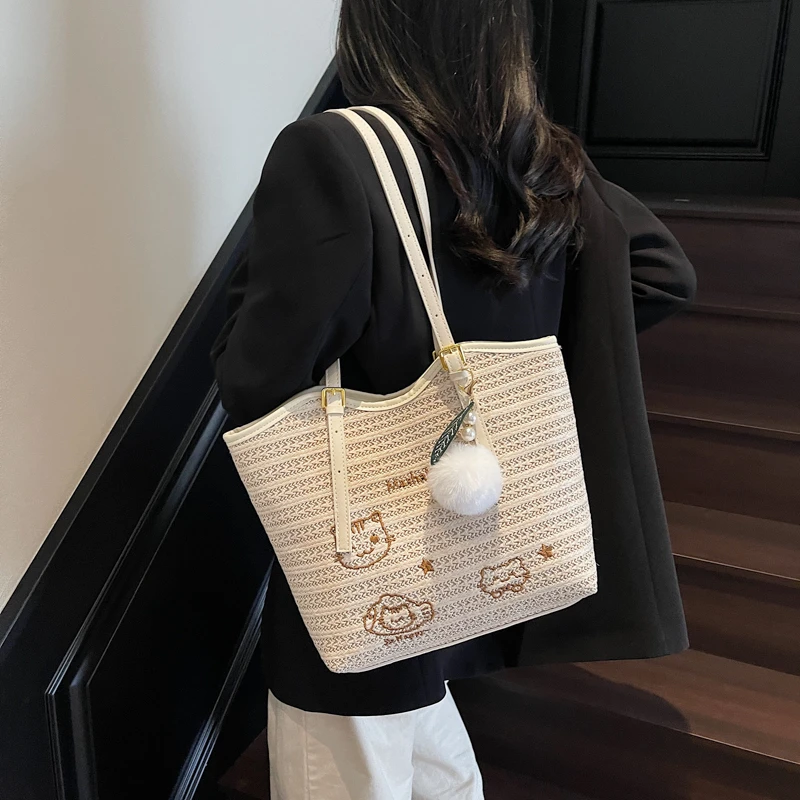 流行爆款草编包包女式2025新款春夏通勤百搭单肩包撞色编织托特包