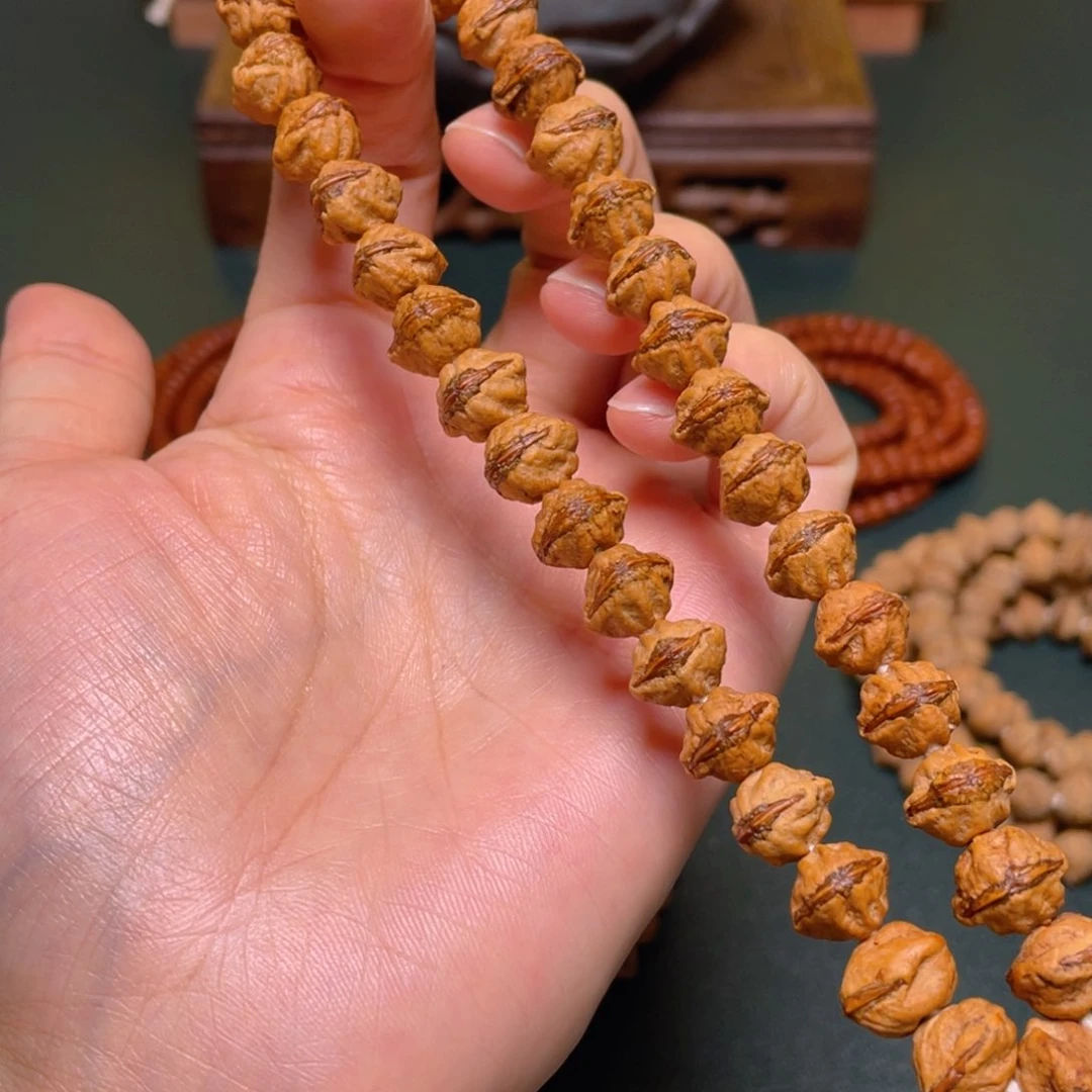 柏香籽/百香籽吊坠红牙龅牙口手持