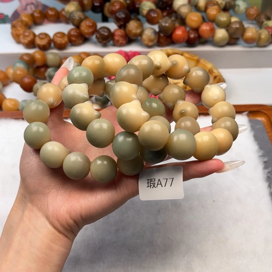 菩提根/象牙果手串17mm瑕猫头随机一串a77