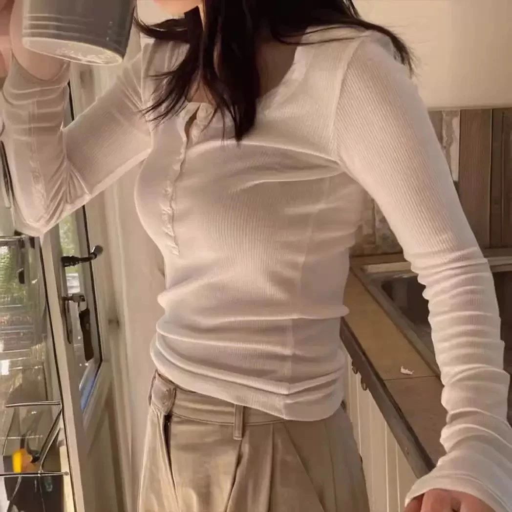 现The barn*net2025韩国新款纯色圆领多排扣长袖T恤