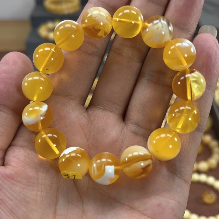 孫***未镶嵌蜜蜡手链纯天然俄料金白溶洞圆珠