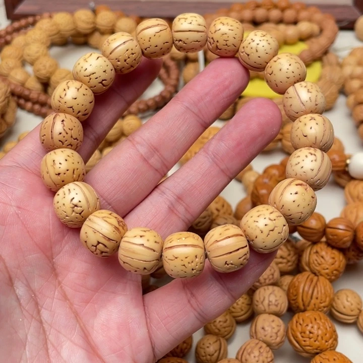 手串桃核奶油核留纹光珠