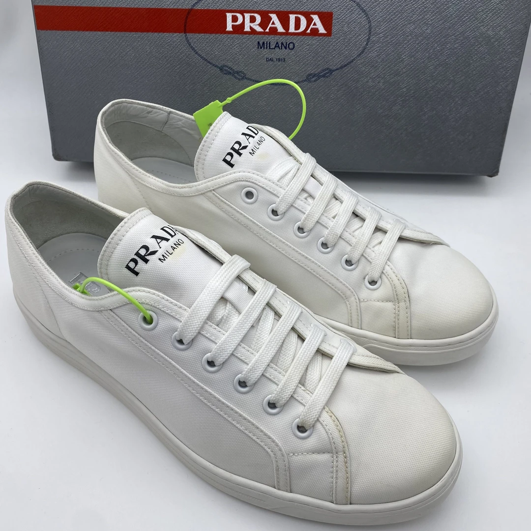 95新 Prada/普拉达 41.5欧码/白色帆布透气休闲时尚系带板鞋