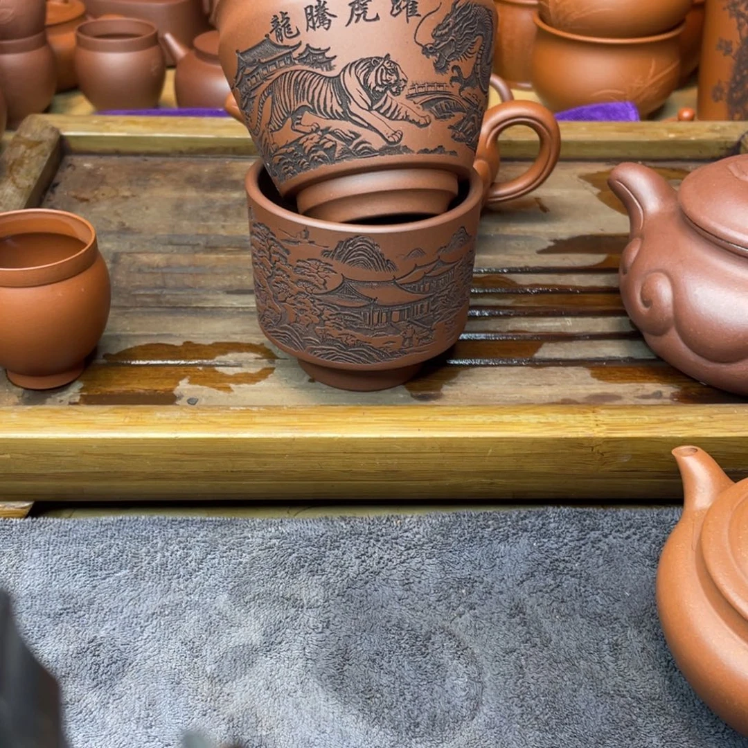 紫砂茶壶主人杯放漏