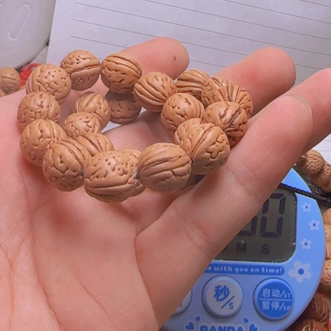 ?*羽拍92野生桃核宽旗三道筋手持一条