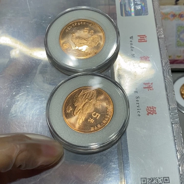 其他普通金属珍惜动物两枚如图