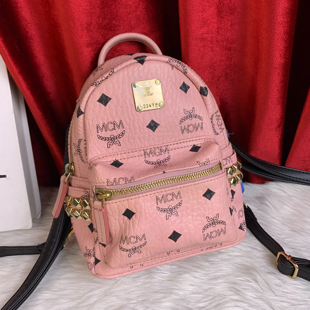 95新 MCM 粉色双肩包/YW06722007/2007