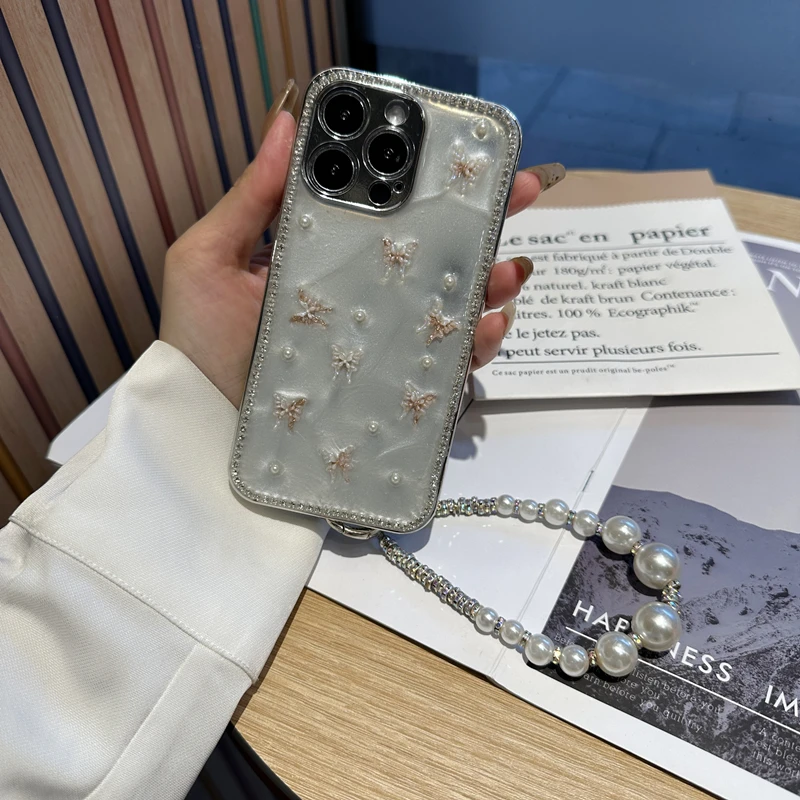 轻奢高级感ins蝴蝶手机壳适用苹果15钻边华为oppo小米vivo镜头膜