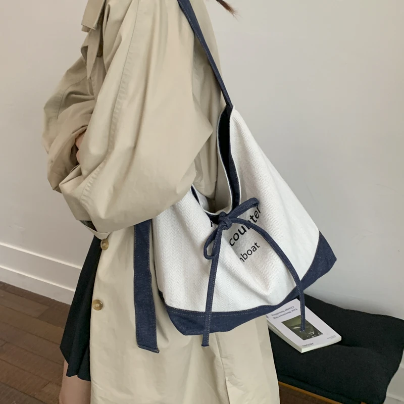 503韩版2025时尚百搭街头潮流大容量帆布袋可爱卡通单肩包帆布包