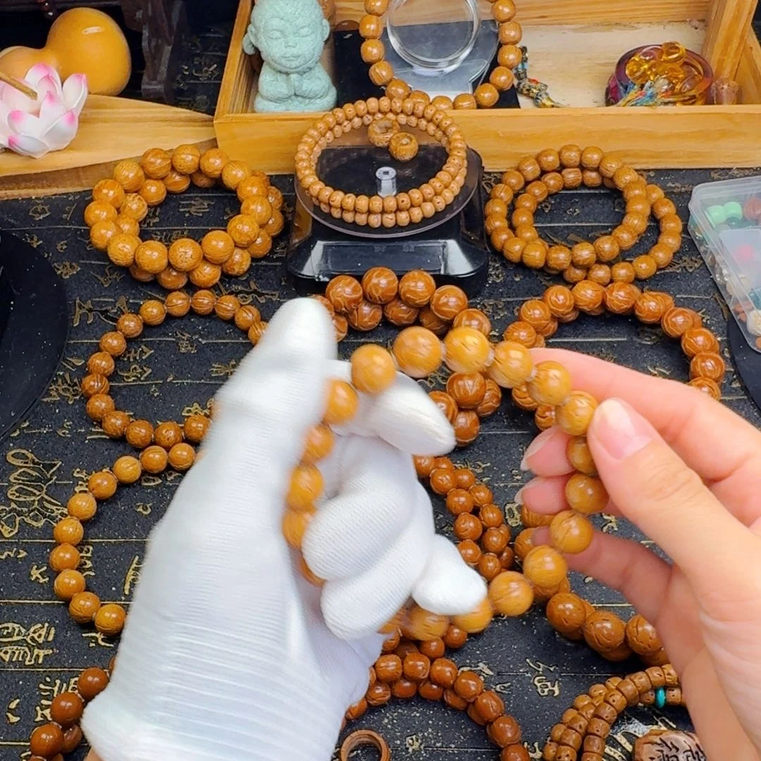 象***生桃核手串11尺寸小金豆
