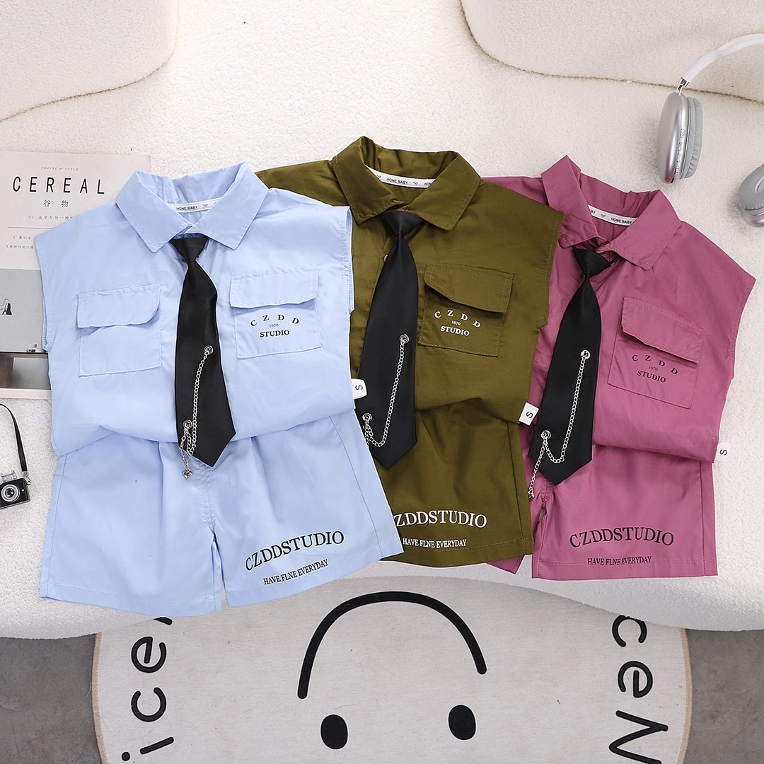 学院时尚夏季工装男休闲套头翻领韩版童装卡通风单排扣套装洋气