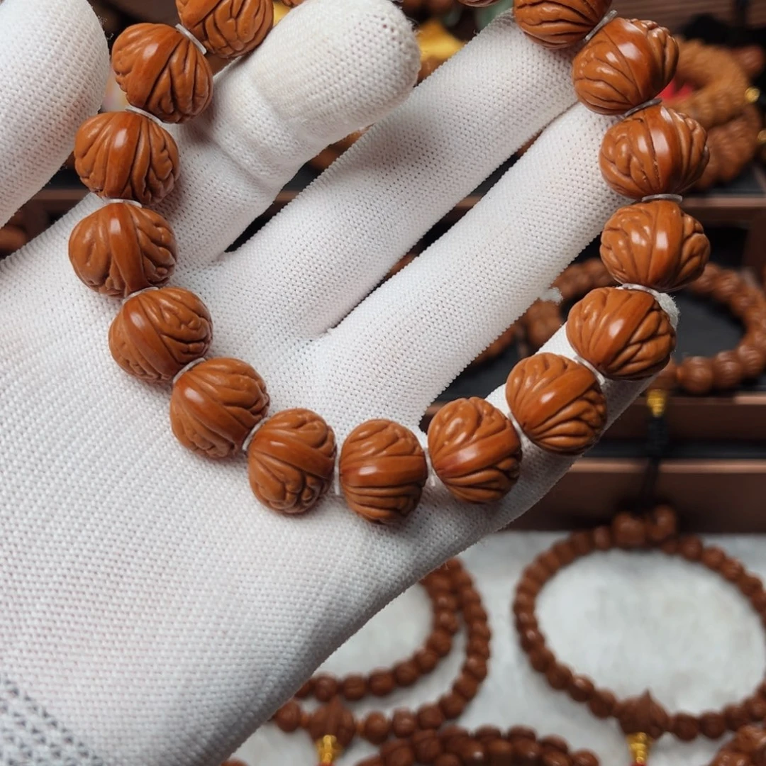 桃核手串呵***～17精品野生龙纹凤羽