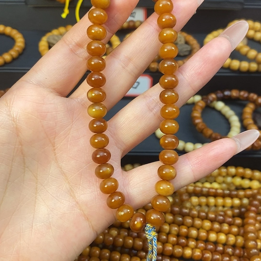 龙眼菩提手串B****C龙脊菩提全透红料算盘手持卡8➕