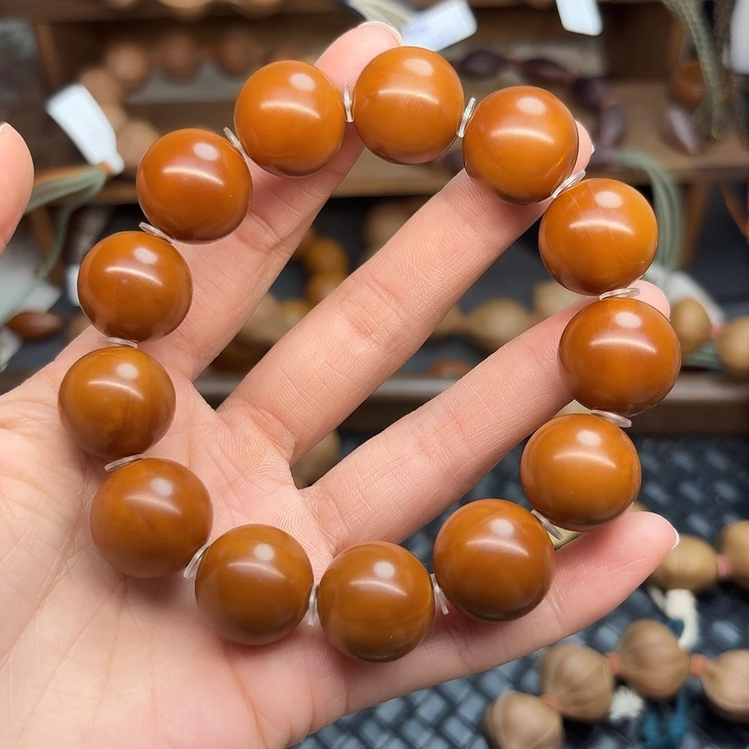 橄榄核手串09。1.8精品正圆光珠