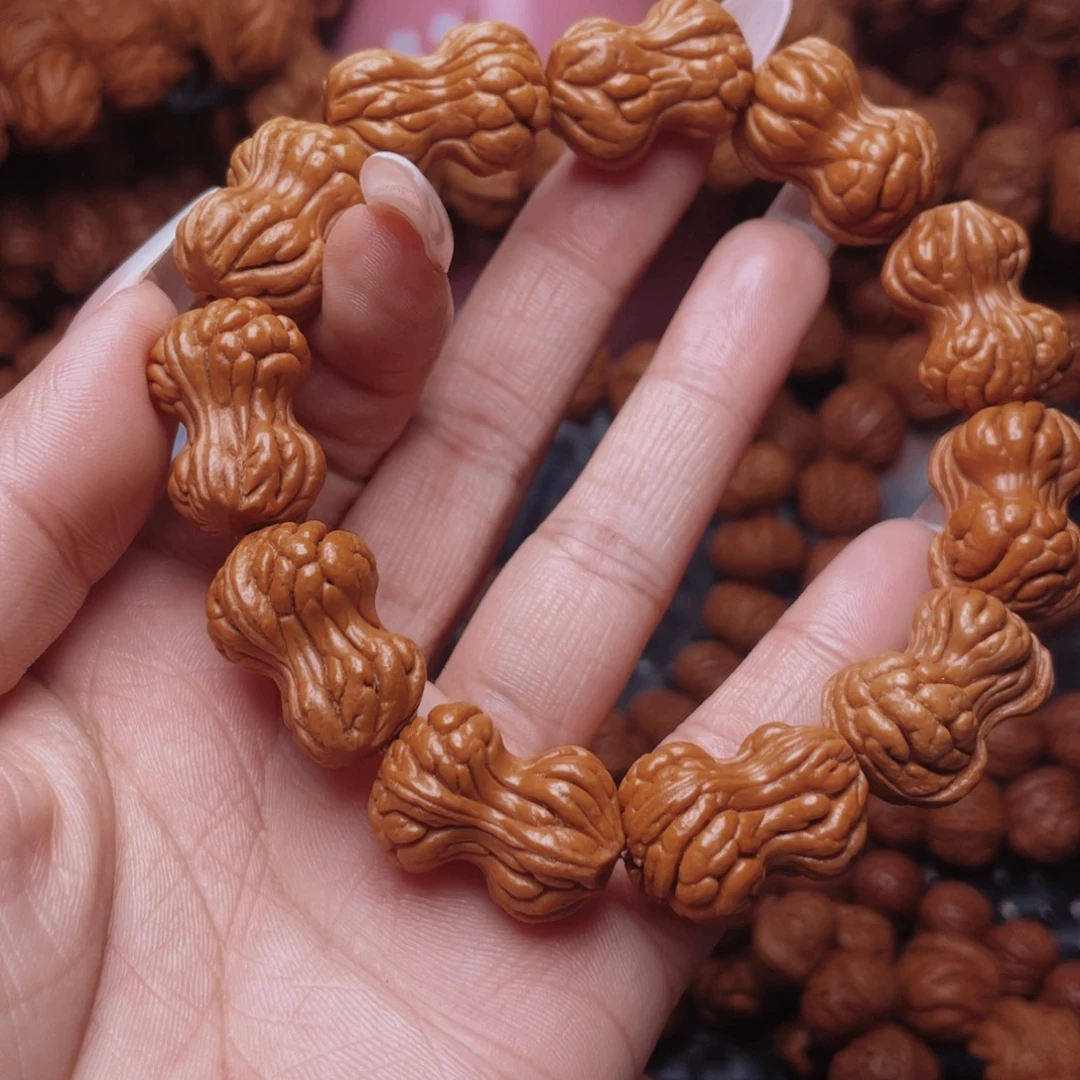 修***生把件文玩核桃龙纹桃核手串