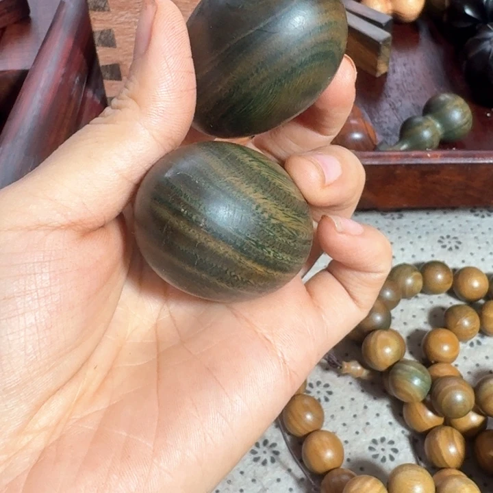 瑕疵手球绿檀一对