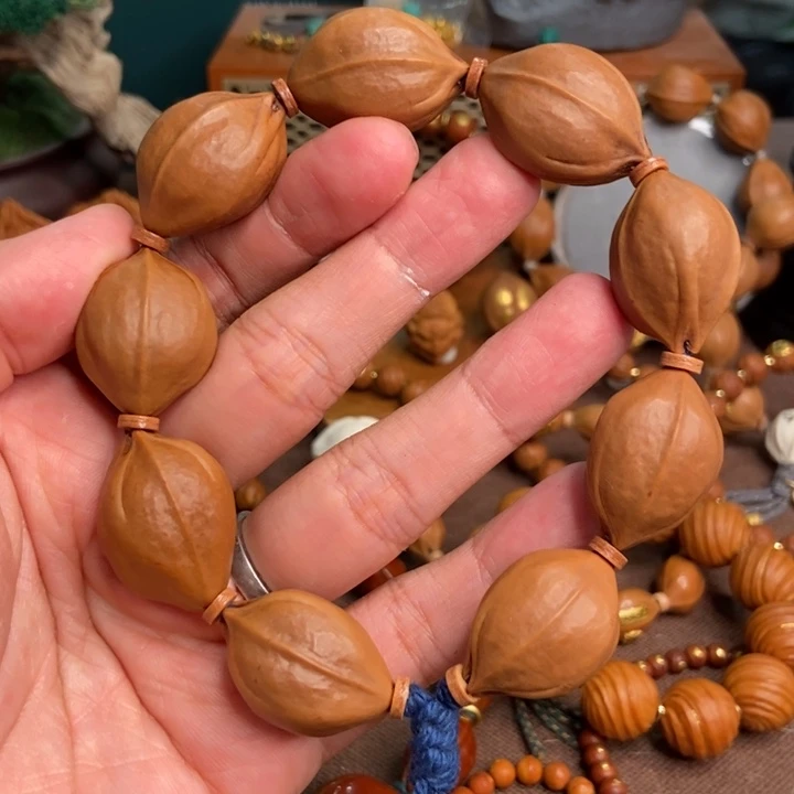 橄榄核吊坠哈哈哈