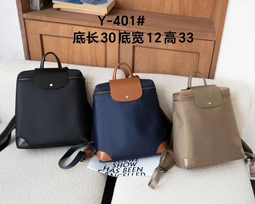 【牛匠甄选2】春夏新款时尚百搭进口面料多隔层大容量双肩包Y-401