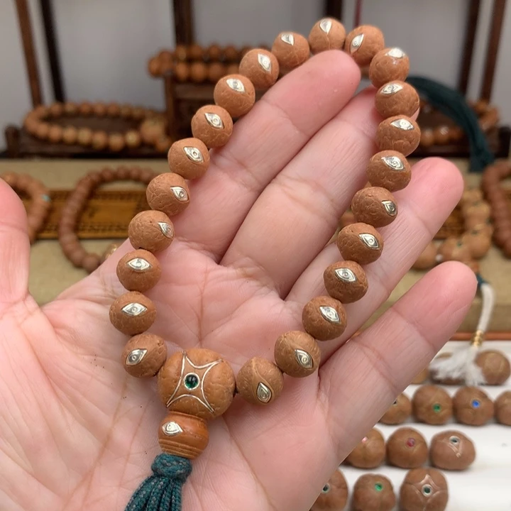 杨***三凤眼菩提吊坠手串