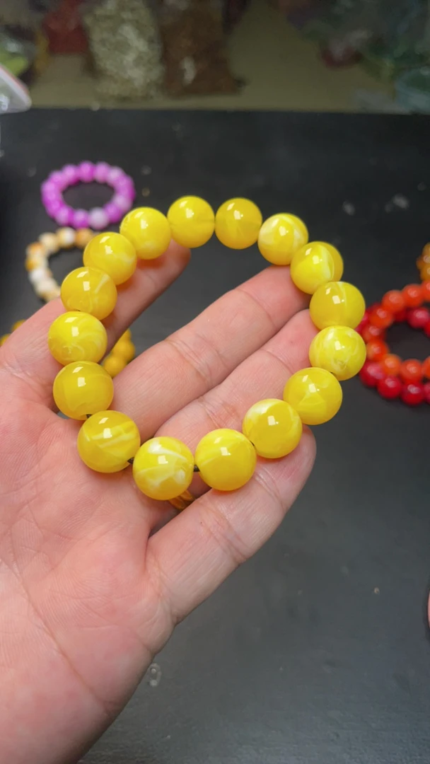 B509  14 老鸡油黄白花蜜手串