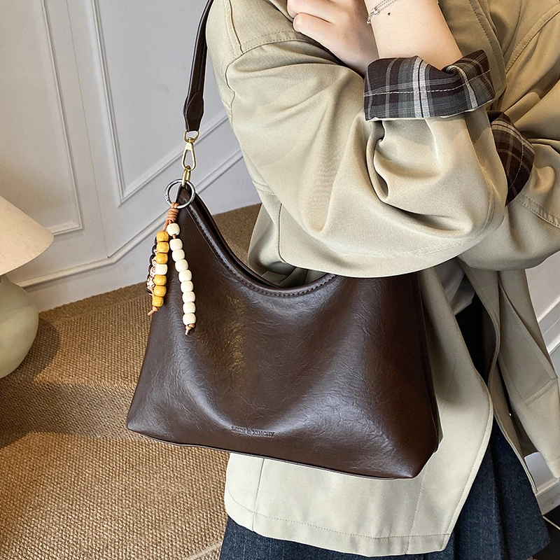 高级感复古小包包女式2025新款时尚通勤百搭单肩腋下包外出小拎包