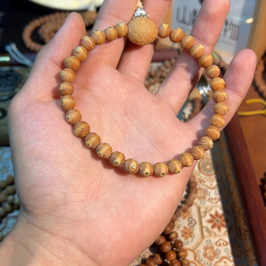 M***刘凤眼菩提吊坠酸枣核凤眼菩提镶嵌