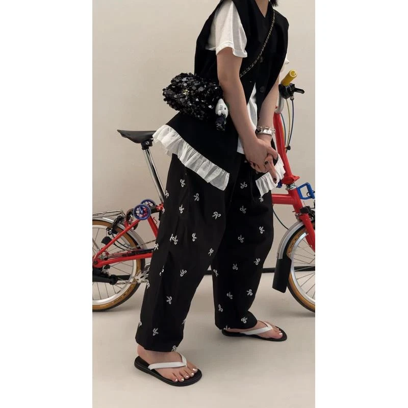 高品全刺绣蝴蝶结廓形裤 J24K141