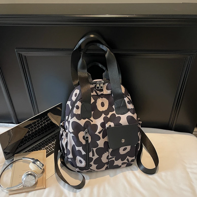 双肩包2025年流行女包太阳花大容量单肩包手提包百搭气质外出背包