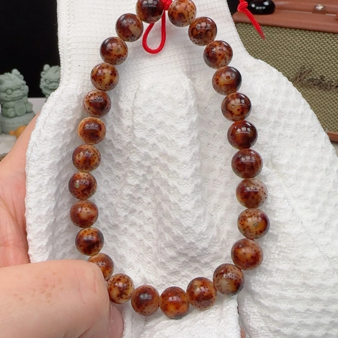 星月菩提手串黑*陈籽火烧云10mm圆