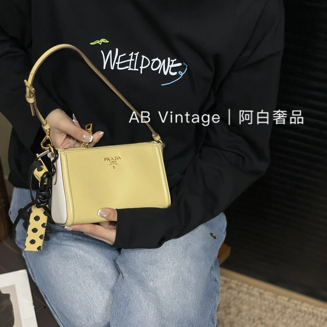 95新 Prada/普拉达 阿白奢品/ 普拉达 奶黄色手提包