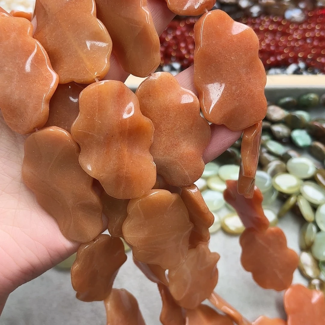 玛瑙/玉髓未镶嵌珠宝半成品30×48红东陵荷叶片一条