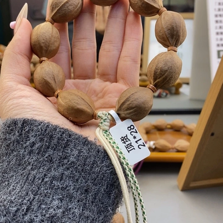 吊坠橄榄核擒****.梅林铁