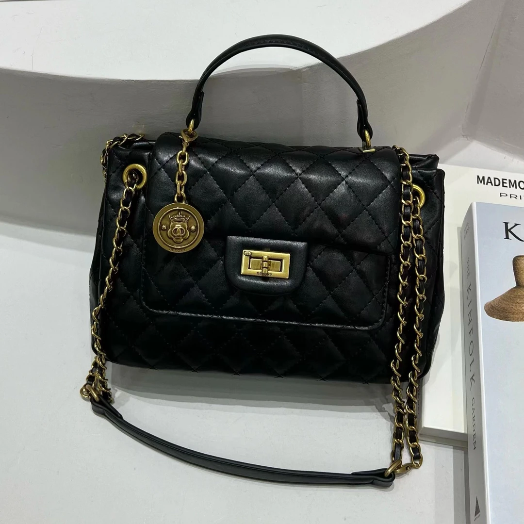 【芝麻集】ZT-D7038-游牧黑RAIN.CUN时尚百搭腋下斜跨轻奢女包