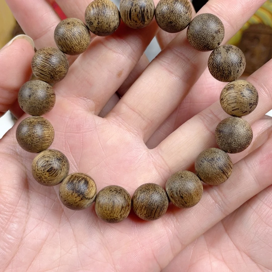沉香手串益****店菩萨棋树心老料1.3