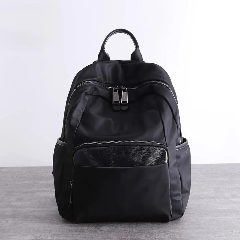 高端奢侈男包尼龙加真皮大容量百搭通勤休闲双肩包男双肩背多功能