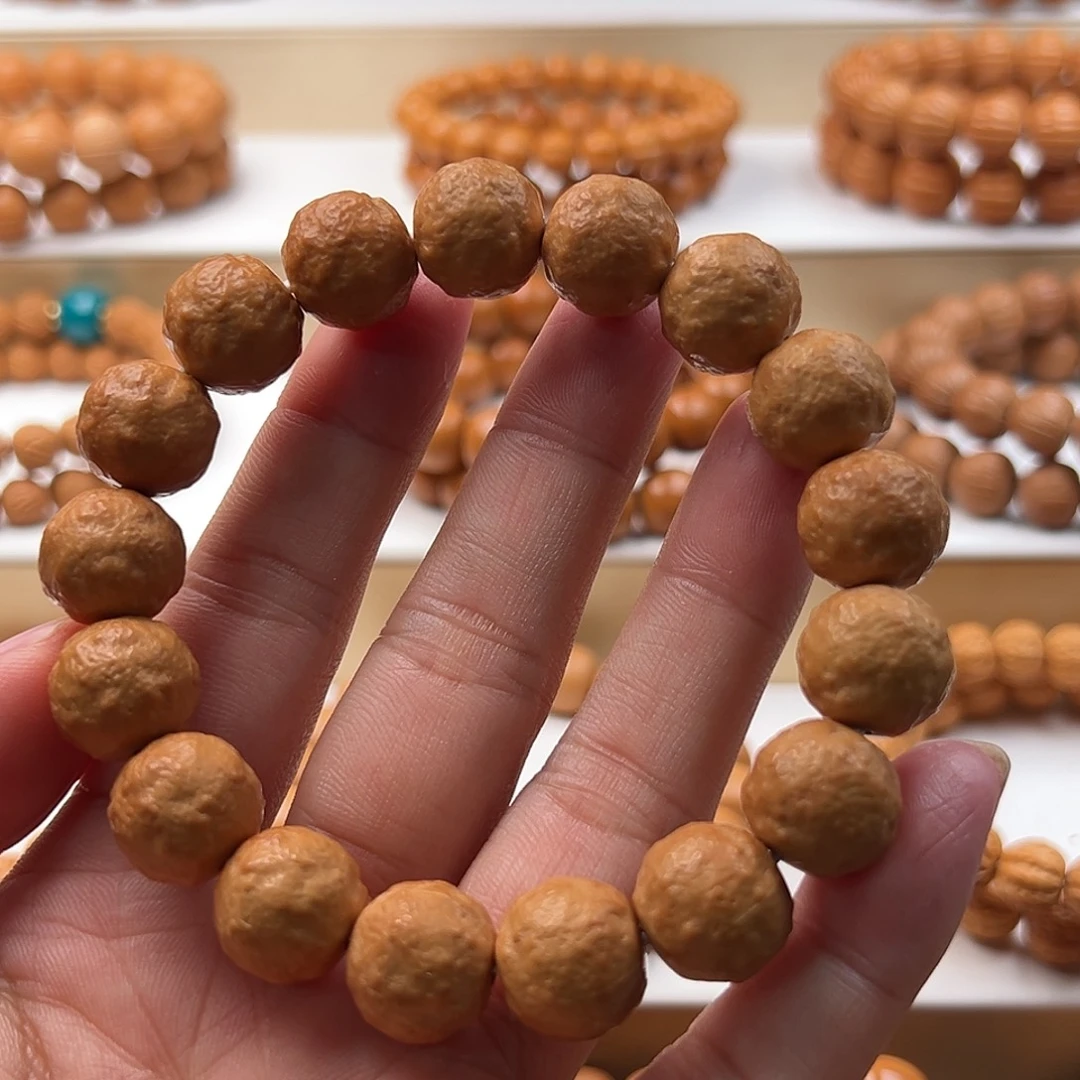 遇***a猴头核桃手串砂糖橘