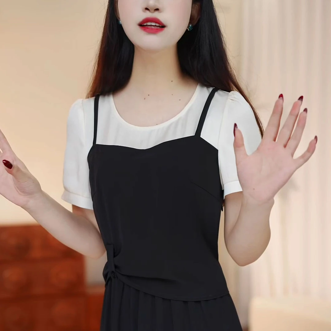 假两件时尚设计感吊带A字裙2025夏季新款气质减龄显瘦纯色连衣裙