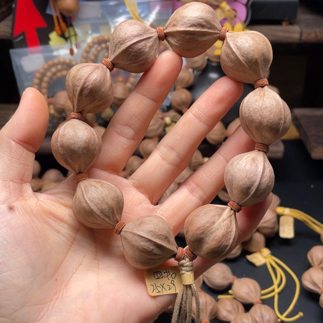 东***石橄榄核吊坠四花铁核2529