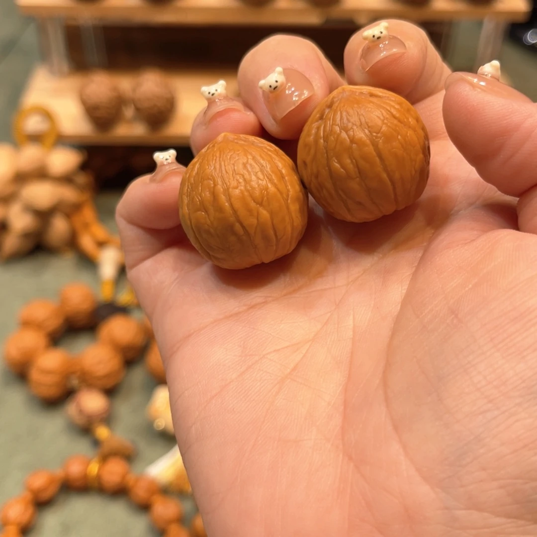 文玩核桃把件光头小龙蛋