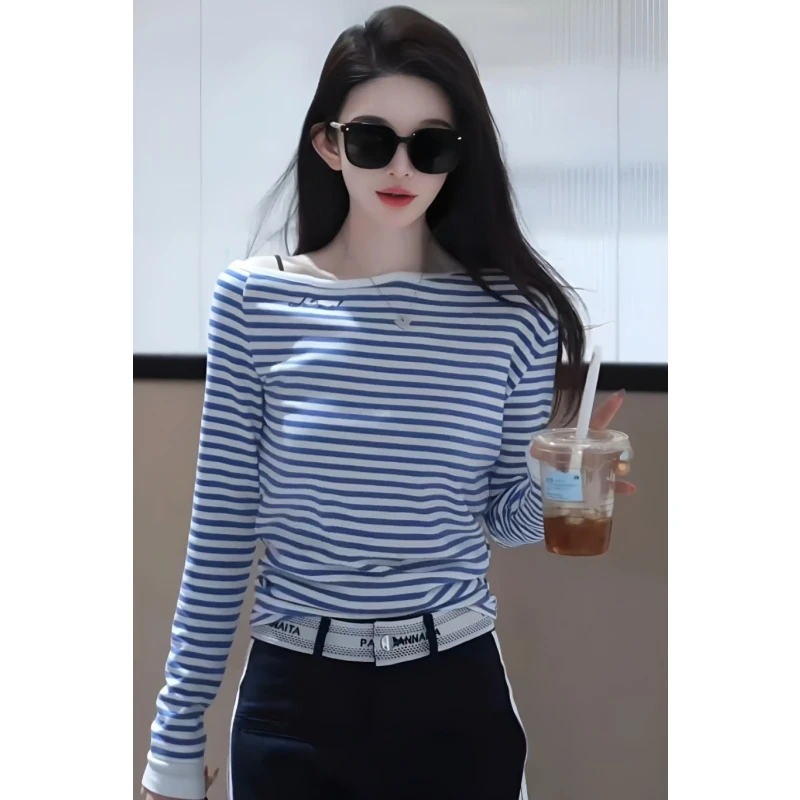 2025蓝色条纹斜肩长袖T恤女春夏新款设计感不规则百搭显瘦上衣女