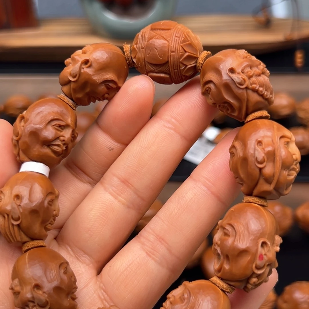 橄榄核吊坠罗汉手串