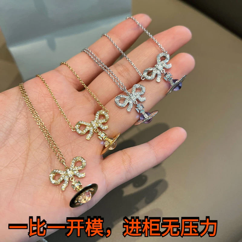 铜陶瓷项链 西太后orb蝴蝶结星球项链少女项链925银金粉银紫球