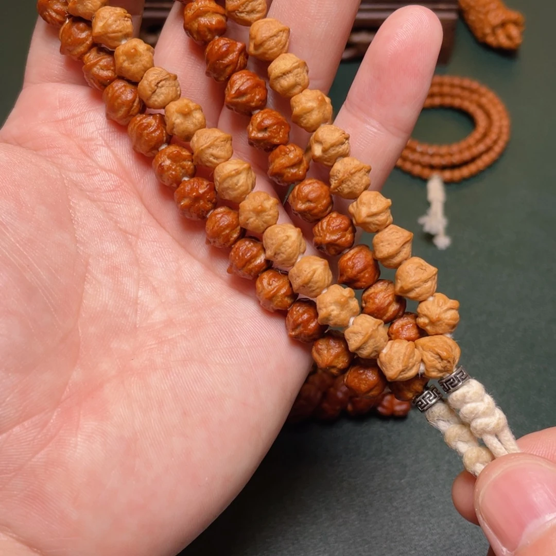 吊坠柏香籽/百香籽白牙横打手持