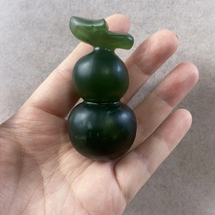 岫玉手把件未镶嵌