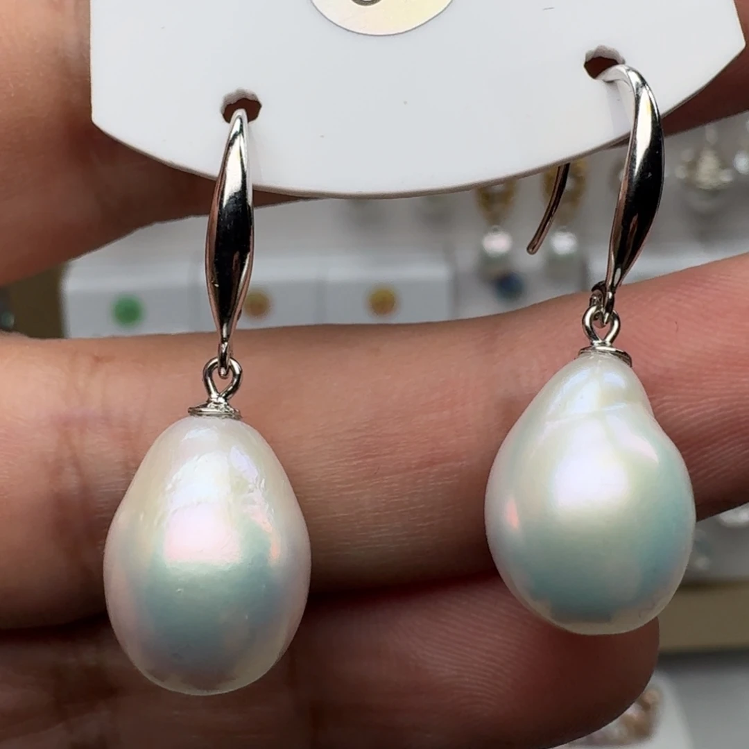 辰***奕淡水珍珠耳饰银S925镶嵌