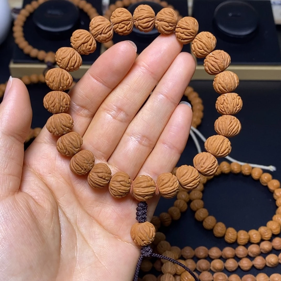 山***龙桃核手串秦岭文玩桃核手持