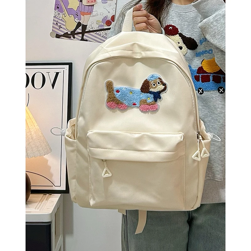 日系新款书包大学生高中生校园简约百搭轻便双肩包纯色ins背包女