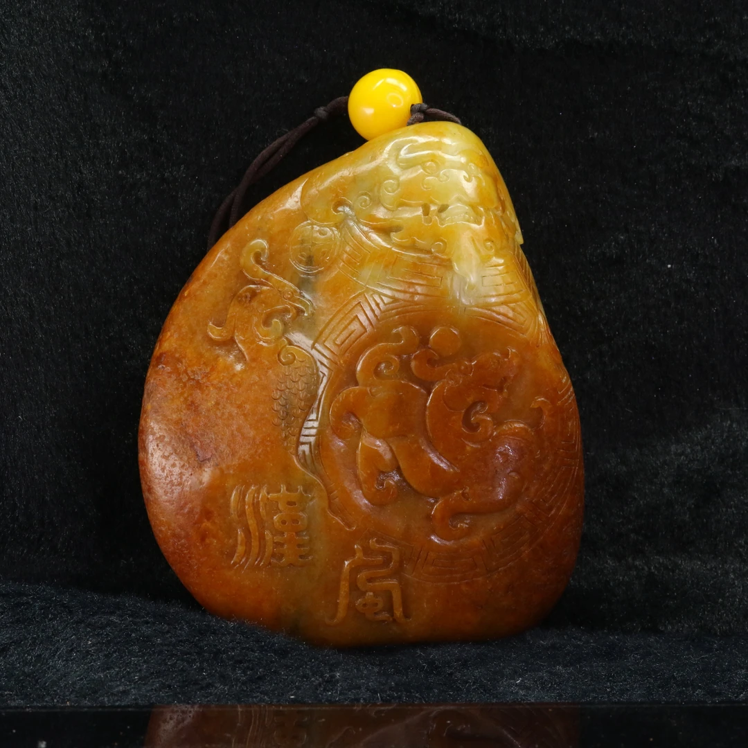 69和田玉红皮籽儿仿古龙摆件/800349保利厦门拍卖