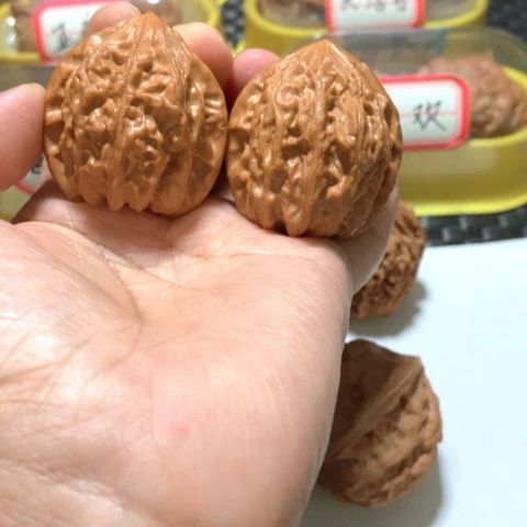 文玩核桃吊坠鸡头